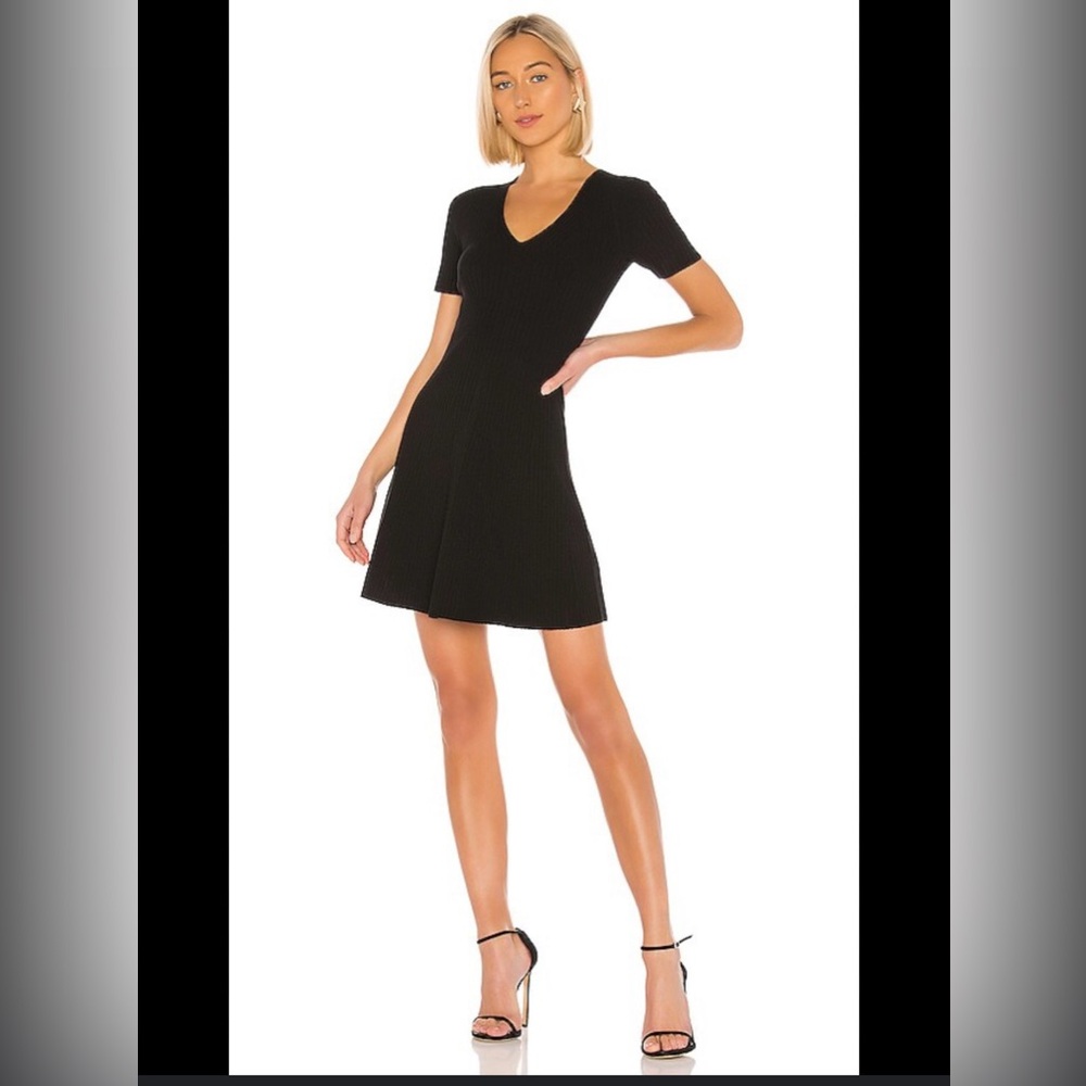 Theory Black Knit Flare RibbedMini Dress The perfect black Dress.